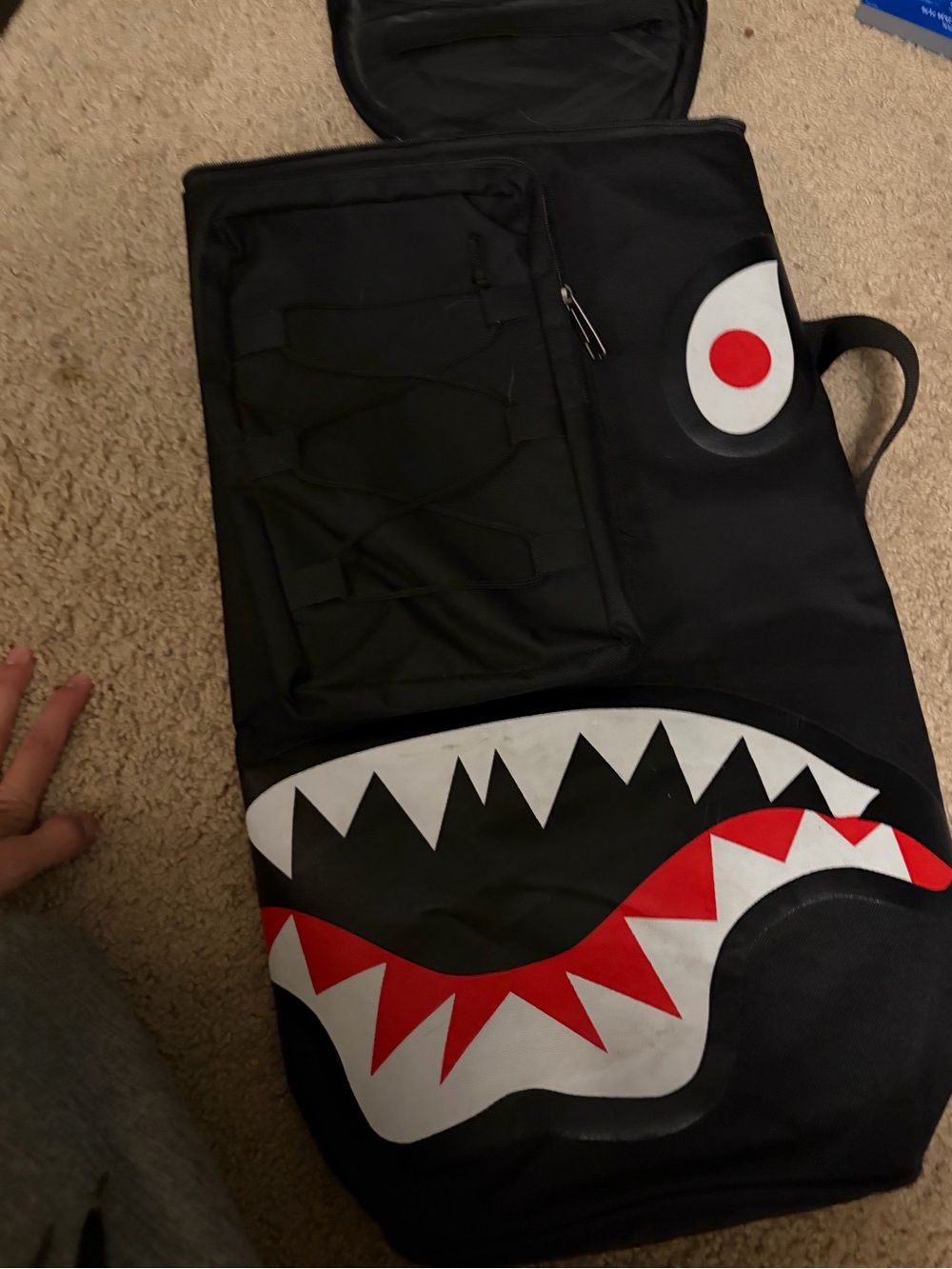 Spray ground duffel bag shark face